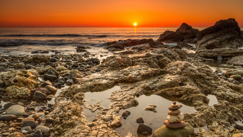 Stacked Stones on Shore