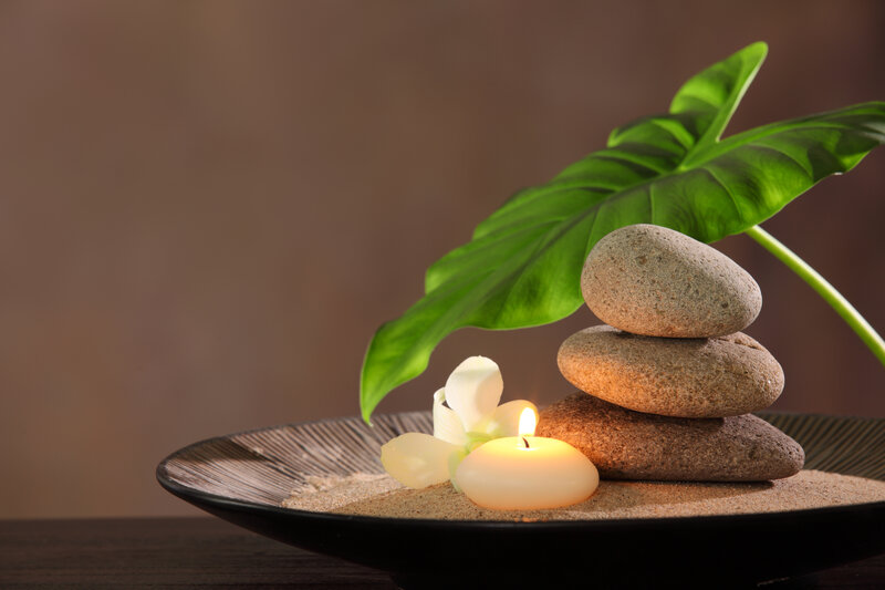 Stacked Stones with Candle