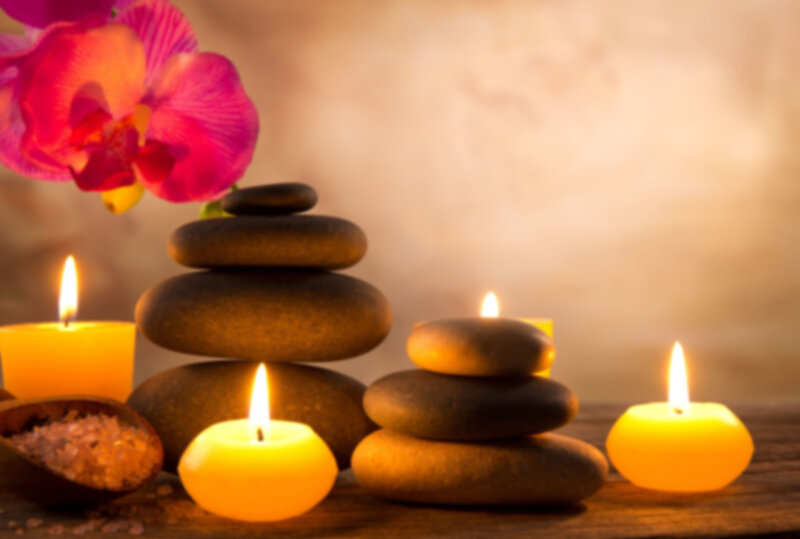 Stacked Stones with Candles — Yellow
