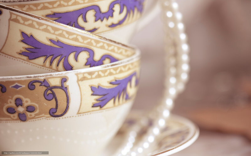 stacked teacups with pearls