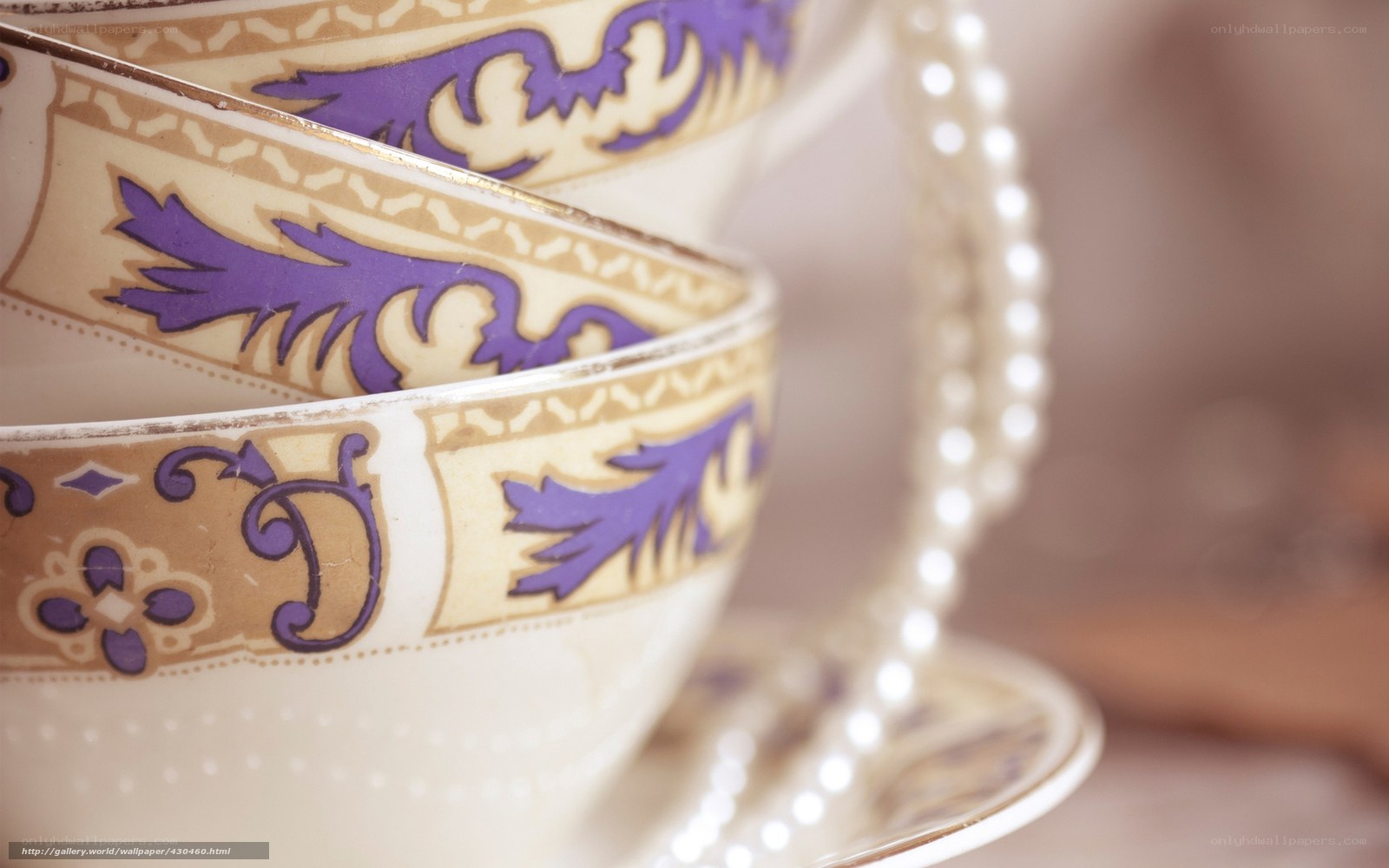 stacked teacups with pearls