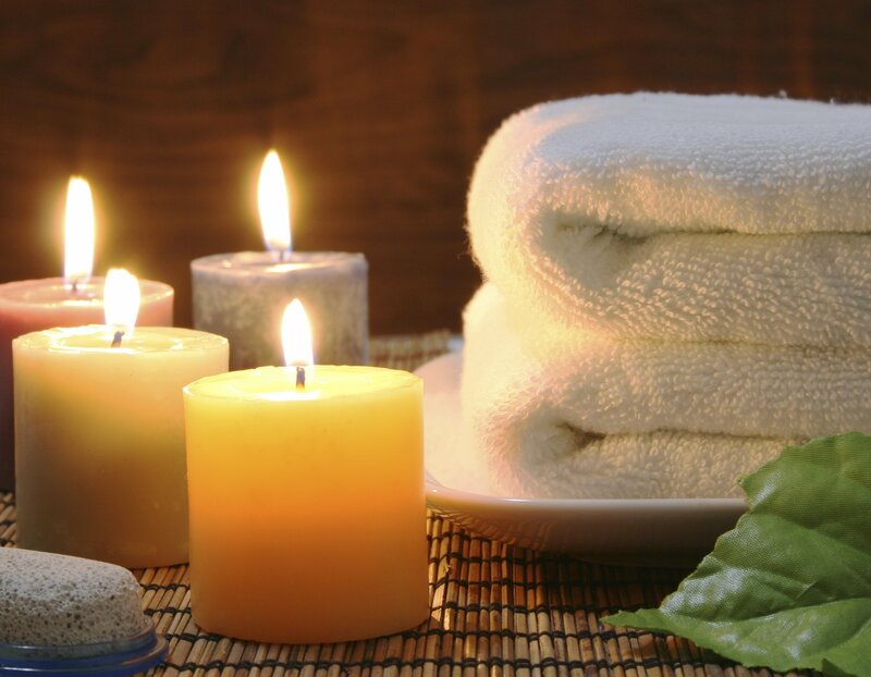 Stacked Towels and Candles