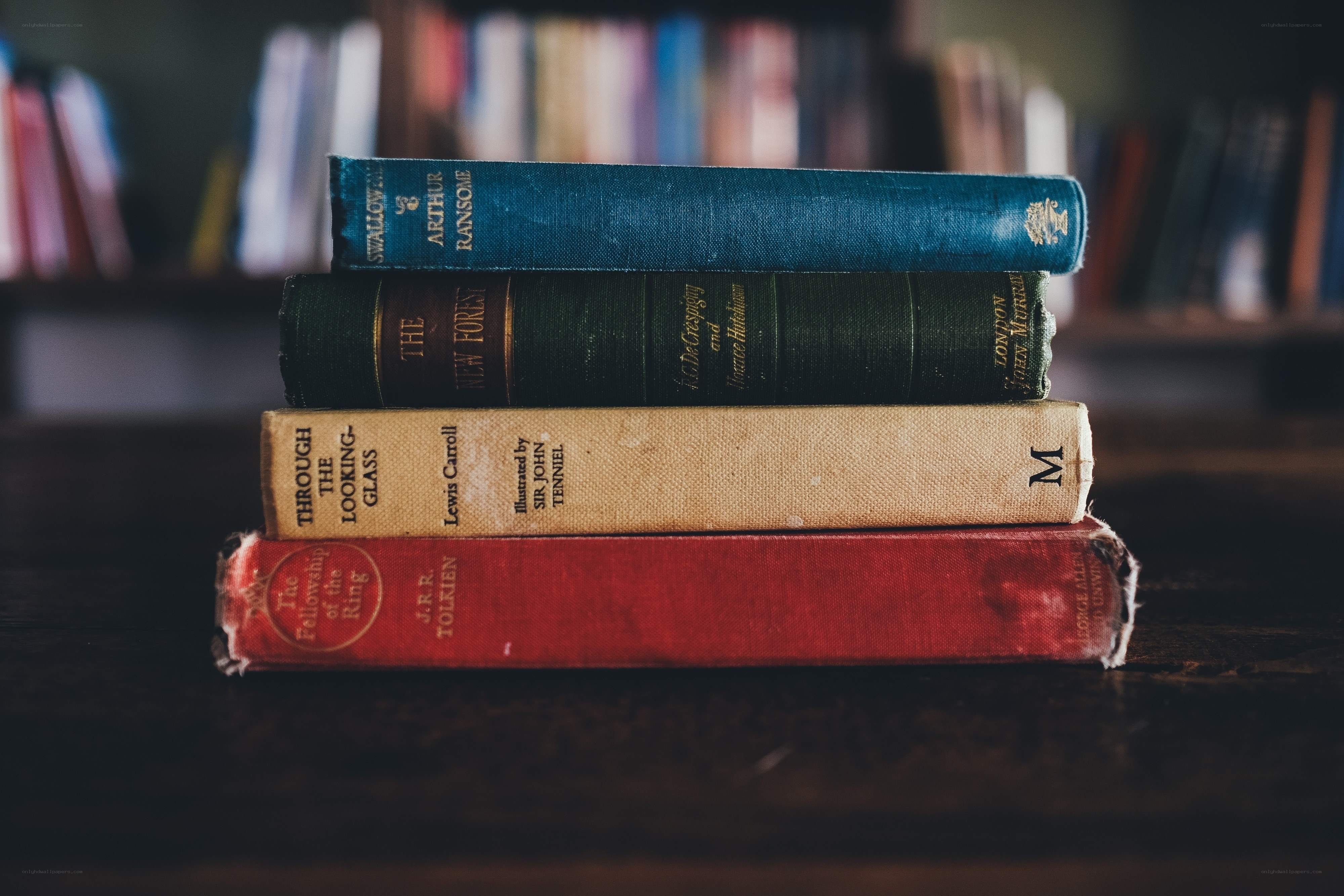 stacked vintage books on table
