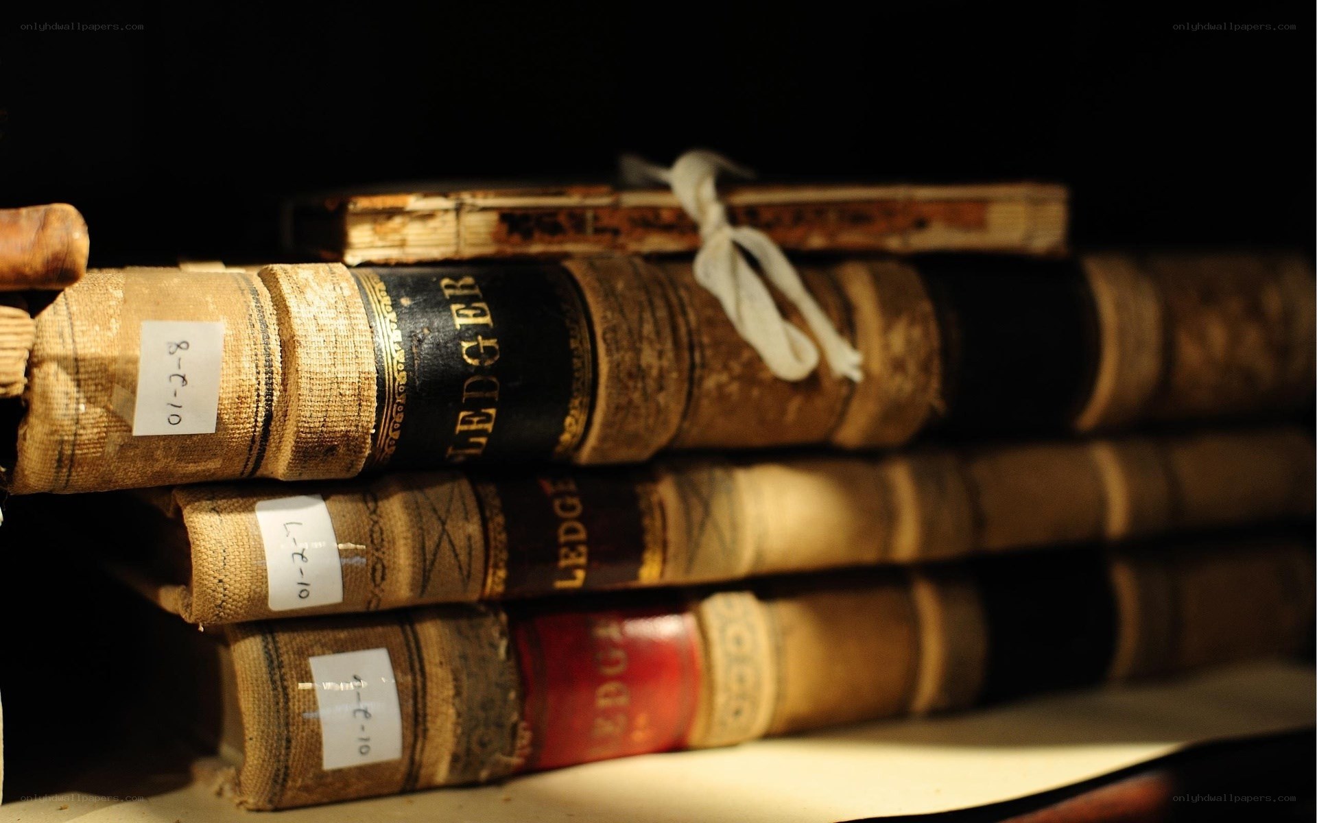 stacked vintage ledgers