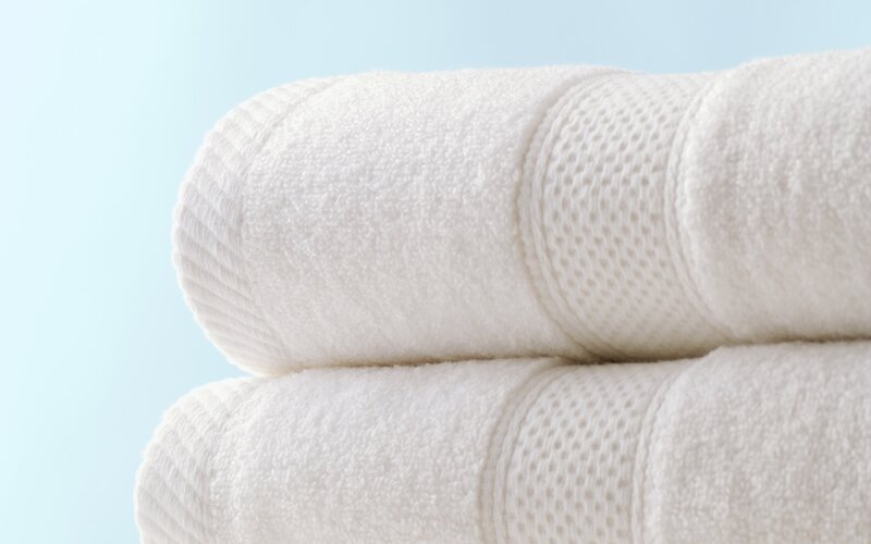 stacked white towels