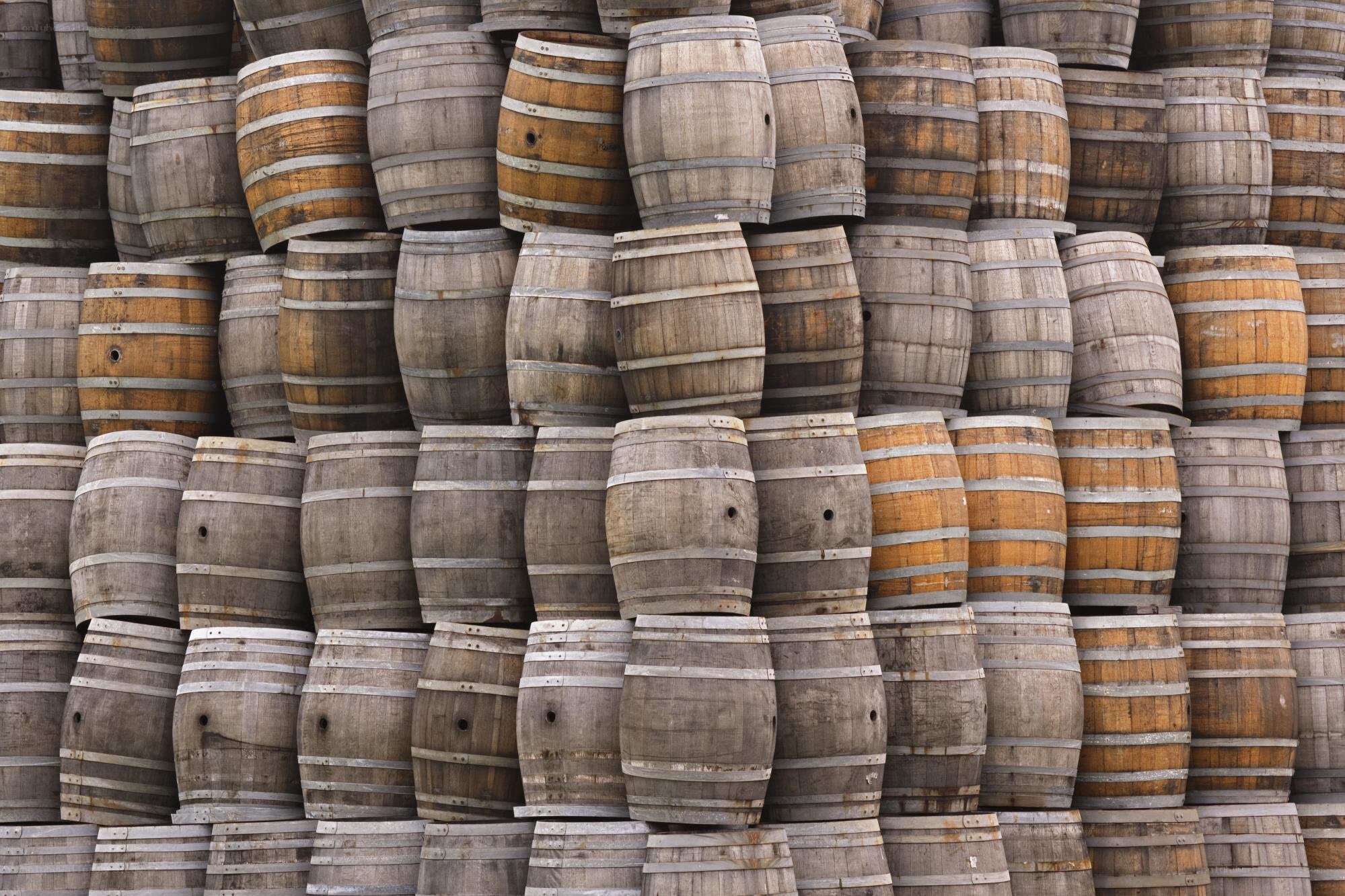 stacked wooden barrels