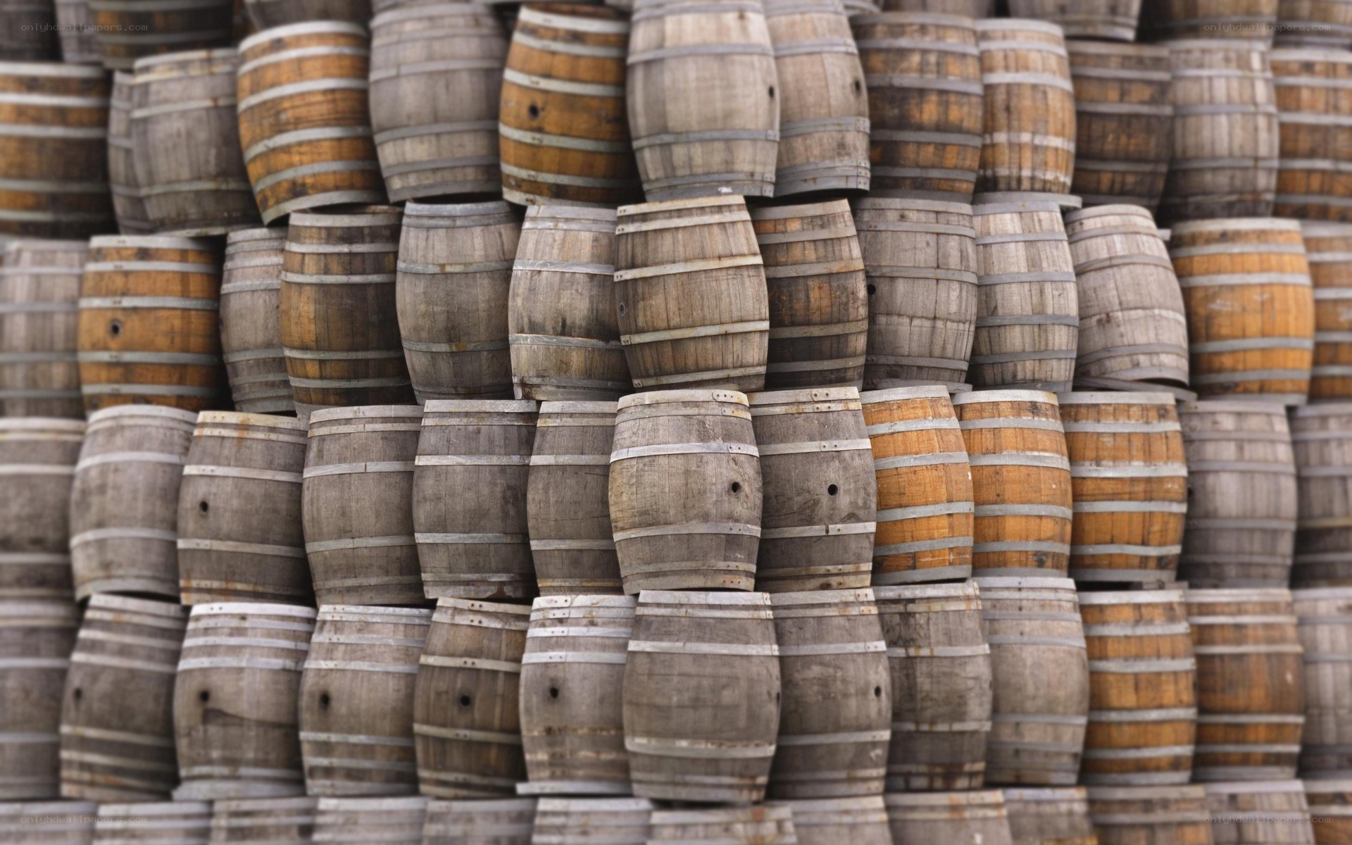 stacked wooden barrels