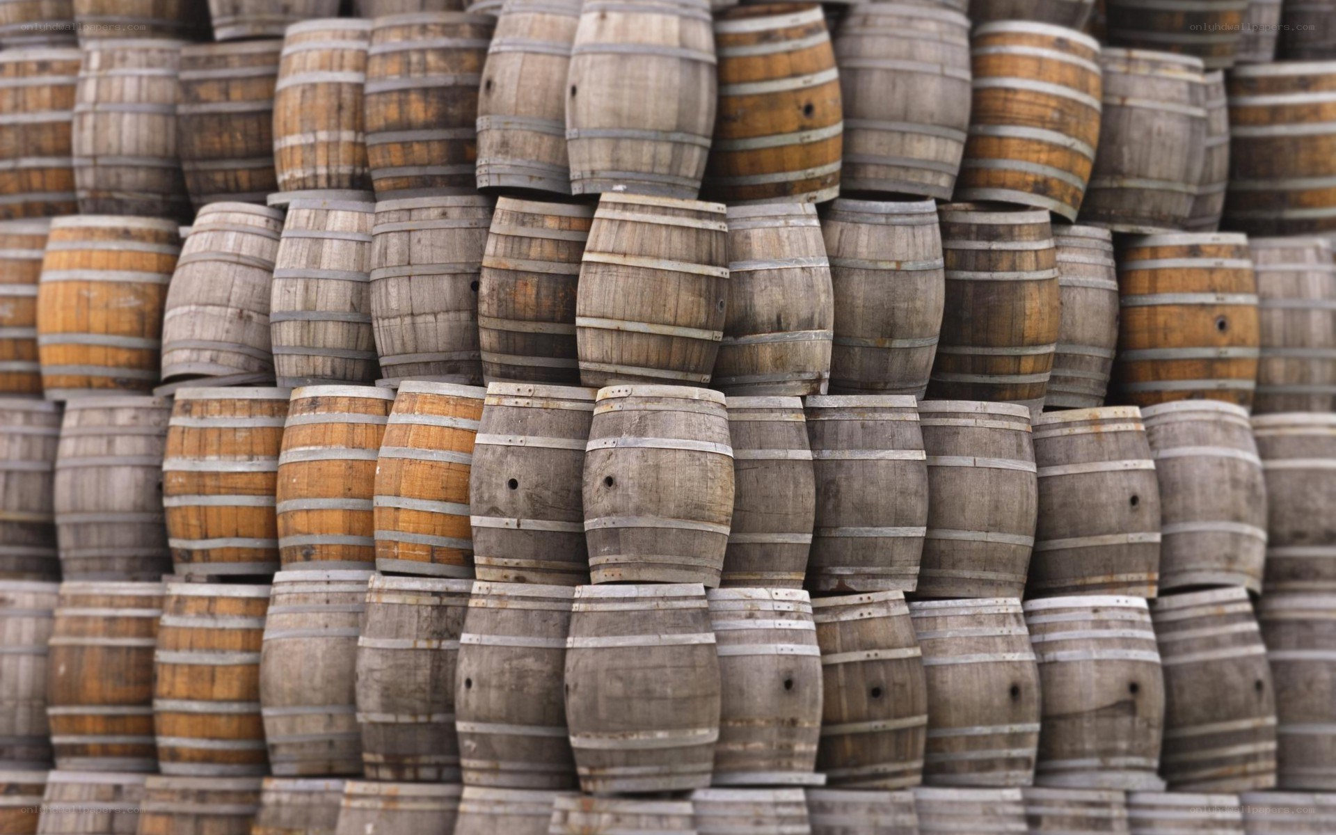 stacked wooden barrels