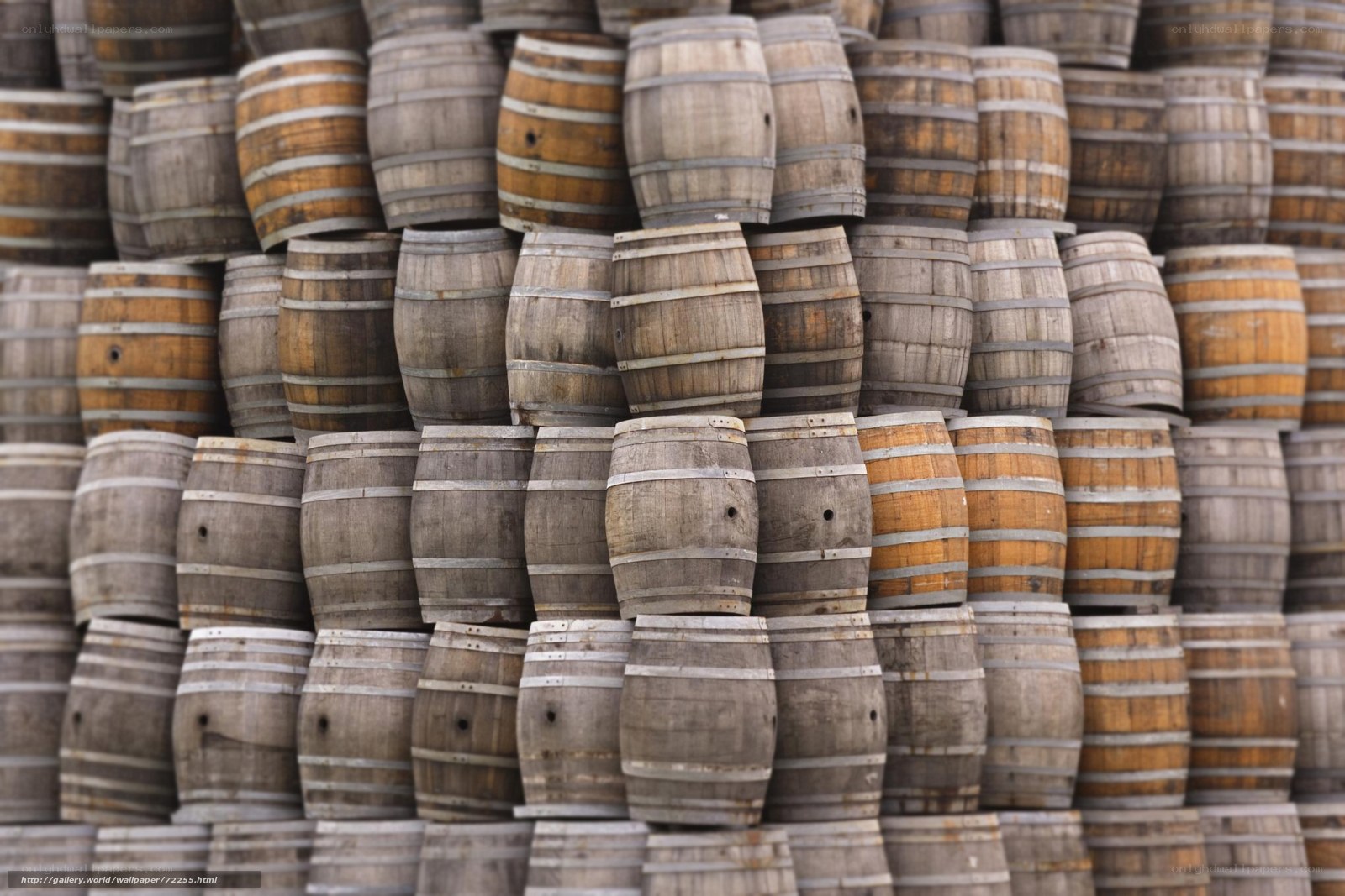 stacked wooden barrels