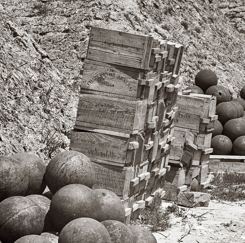 Stacked wooden crates with cannonballs