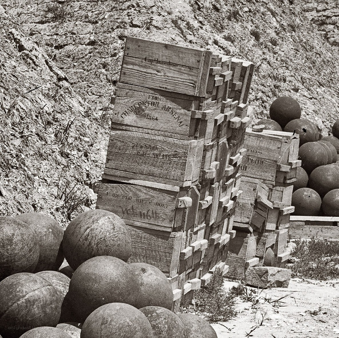 Stacked wooden crates with cannonballs