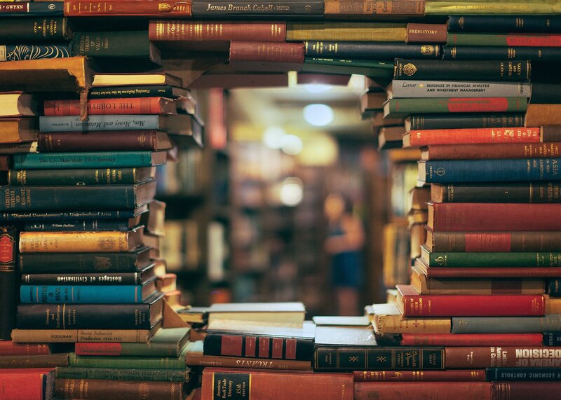 Stacks of Books in Library