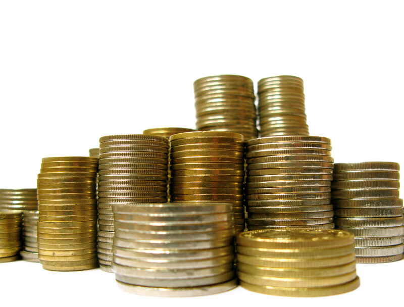 stacks of coins on white
