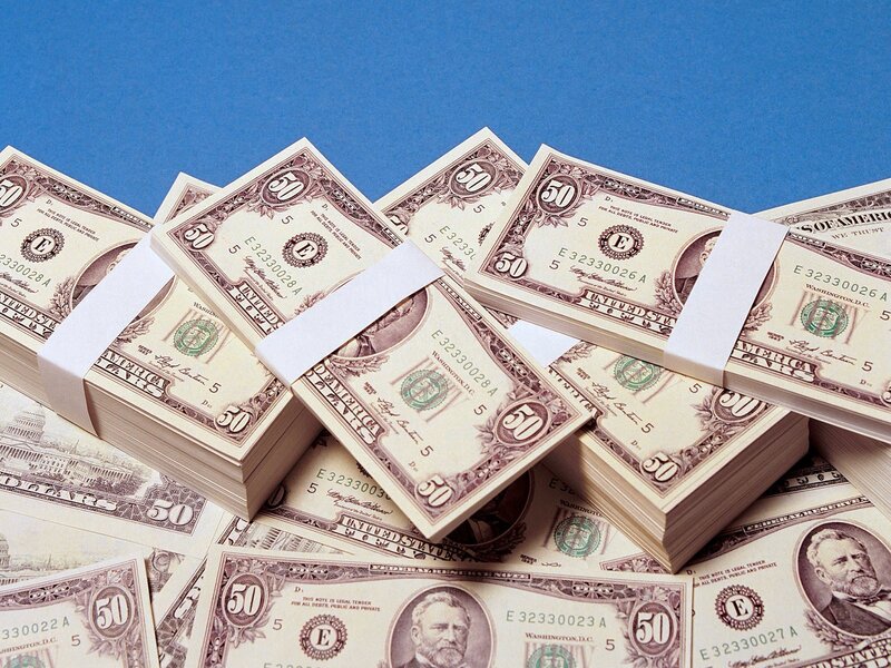 stacks of fifty dollar bills
