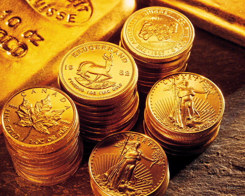 stacks of gold coins and bars