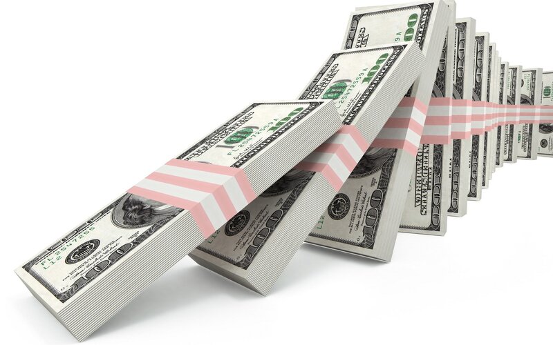 stacks of hundred dollar bills