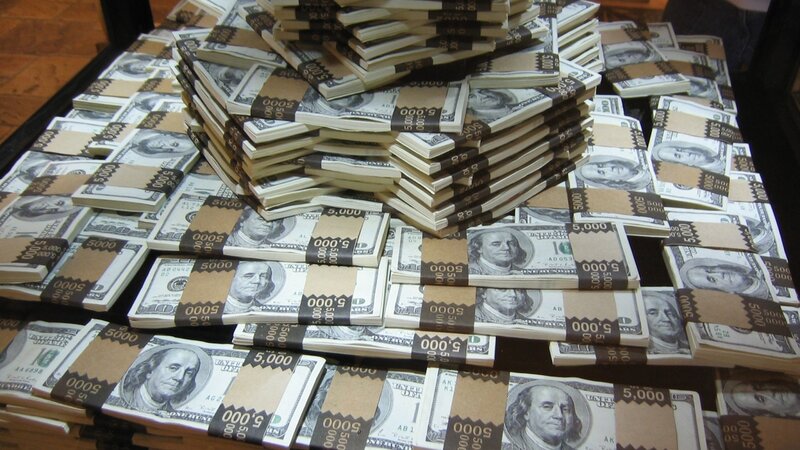 stacks of hundred-dollar bills