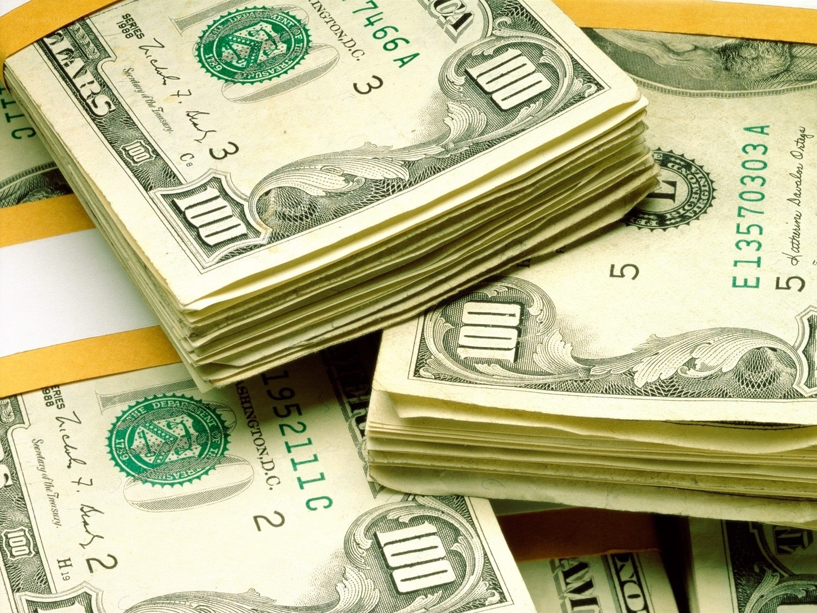 stacks of hundred-dollar bills