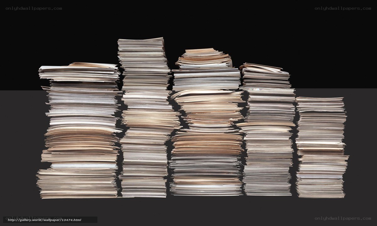 stacks of paper on black