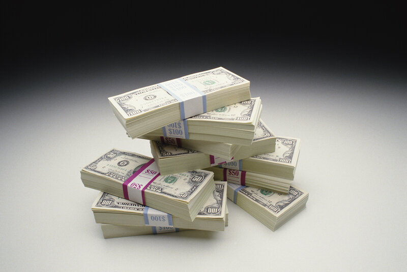 stacks of us currency
