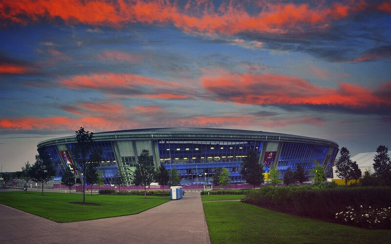 Stadium at sunset with colorful sky