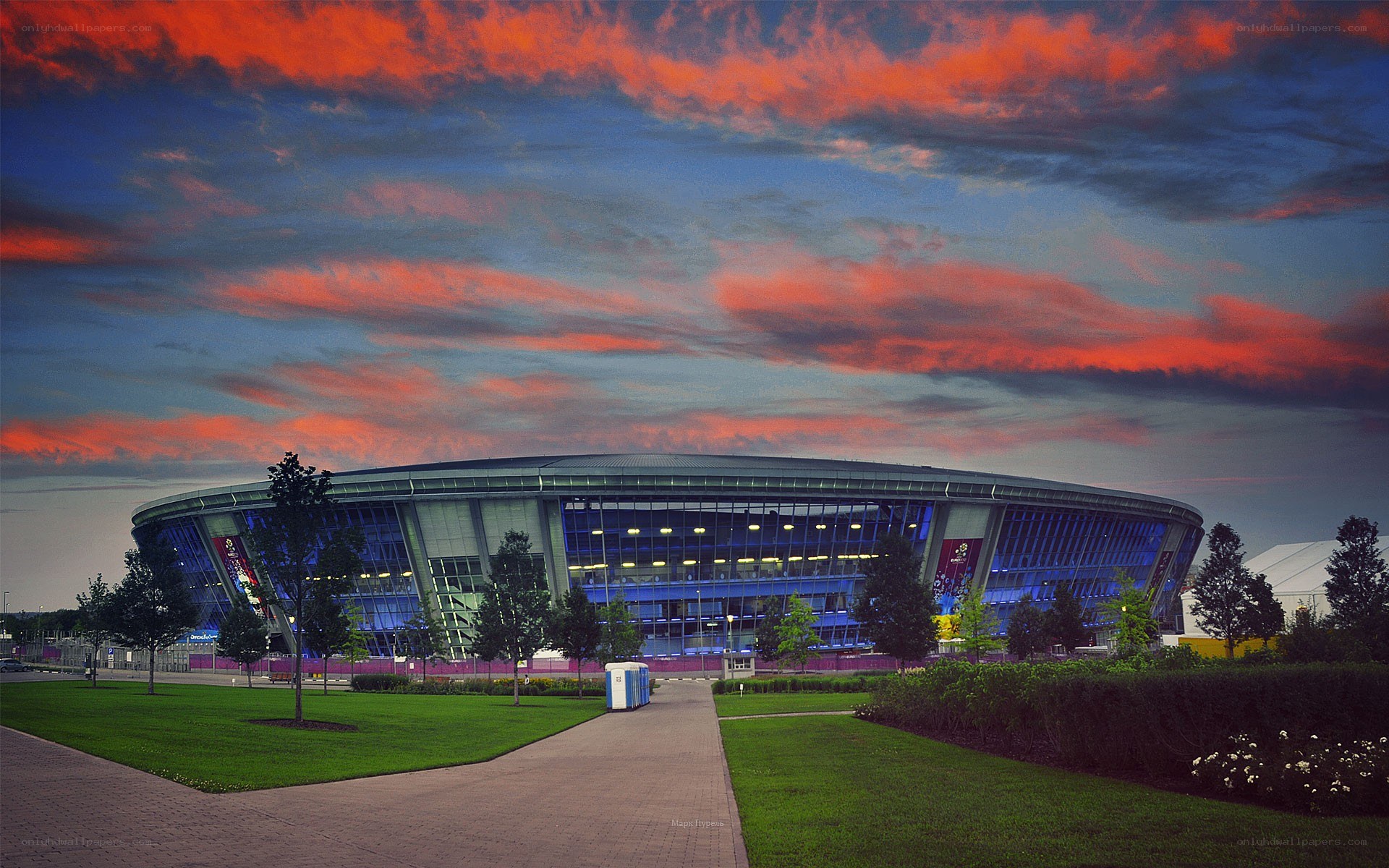 Stadium at sunset with colorful sky