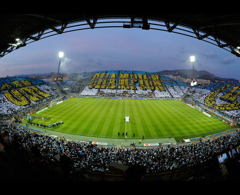 Stadium fans create human mosaic