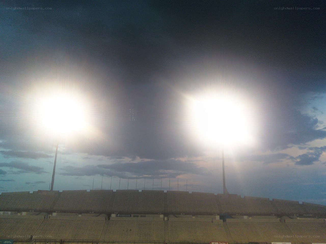 Stadium lights at dusk
