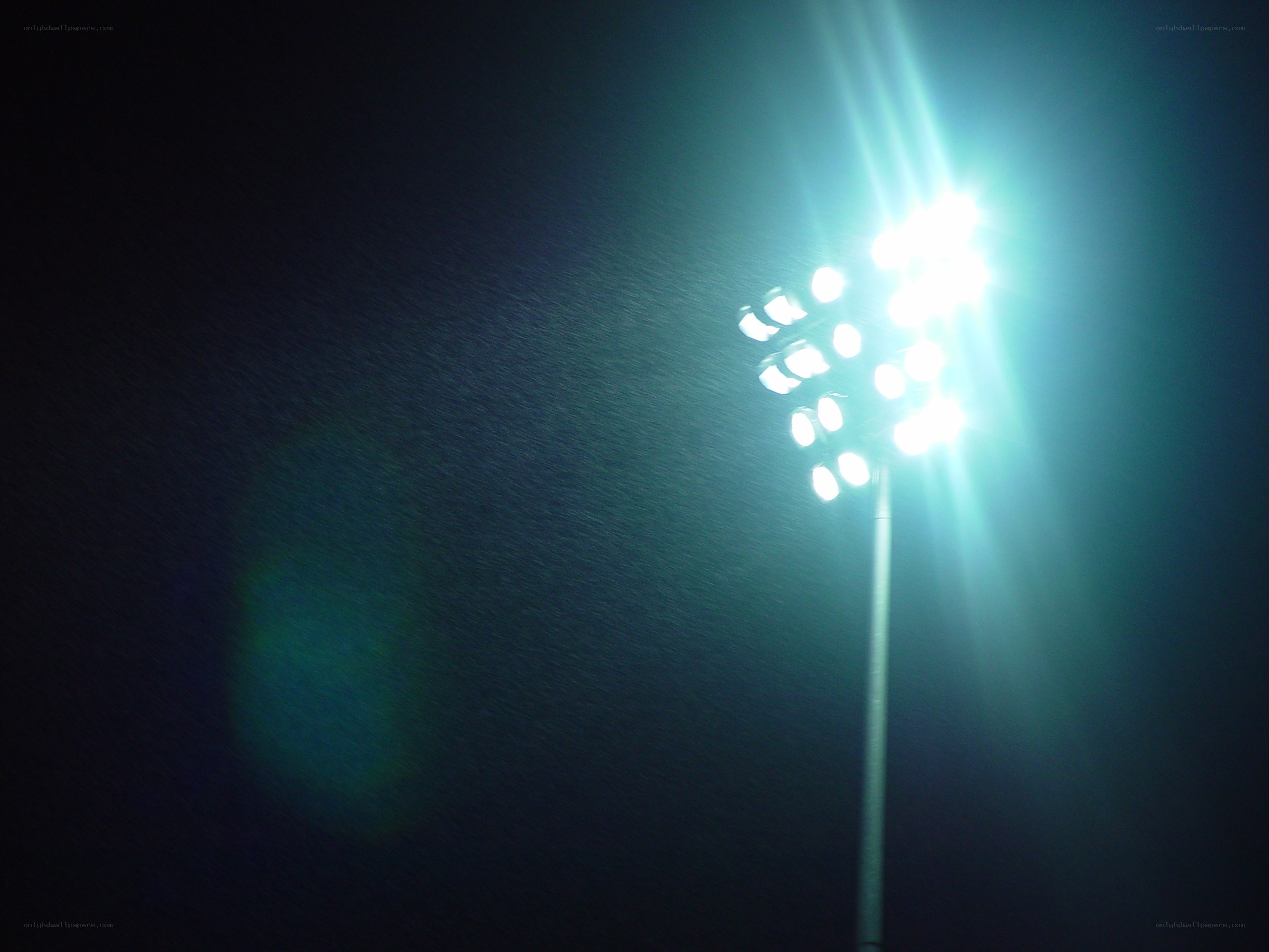 Stadium lights at night