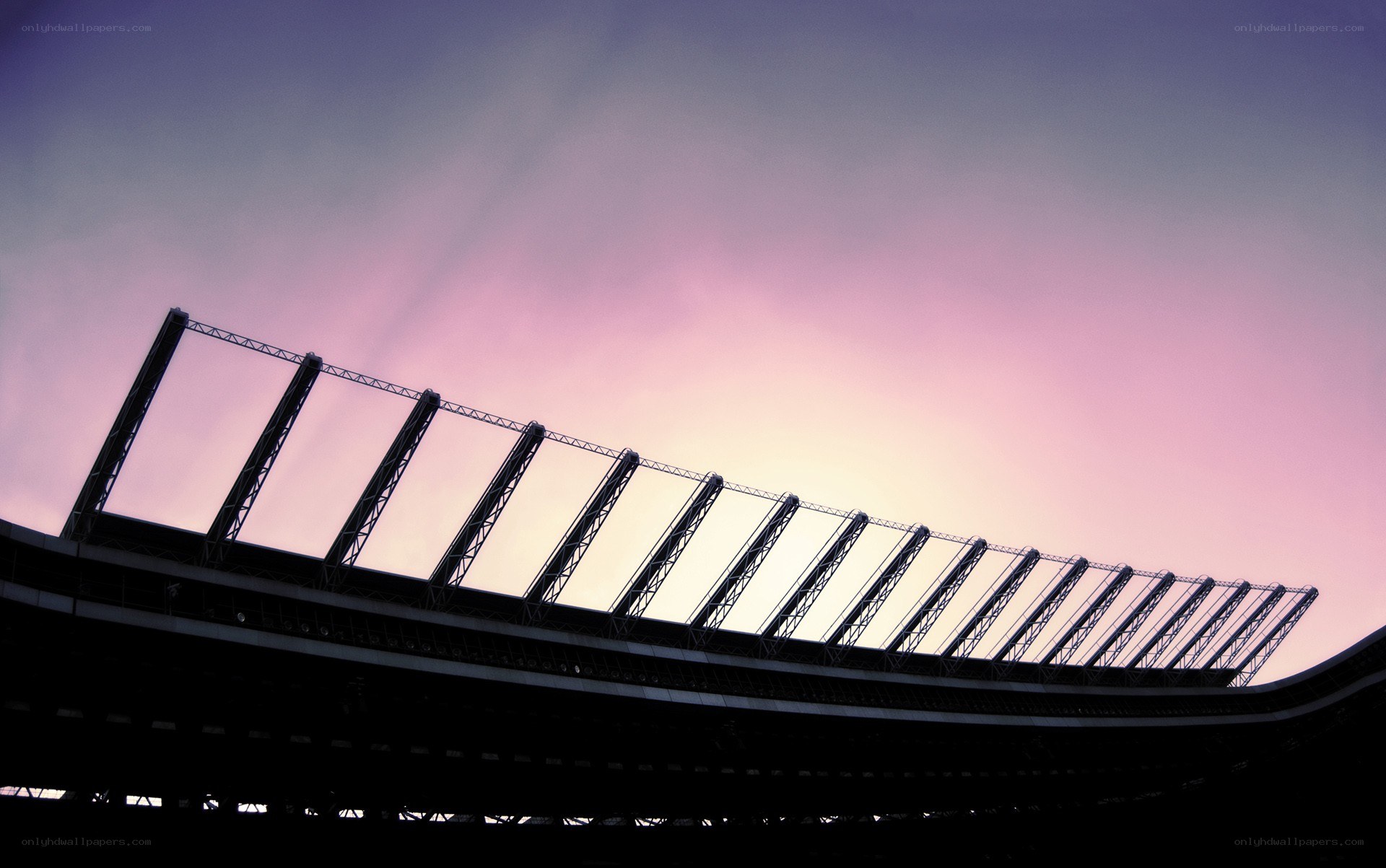 Stadium silhouette at dusk