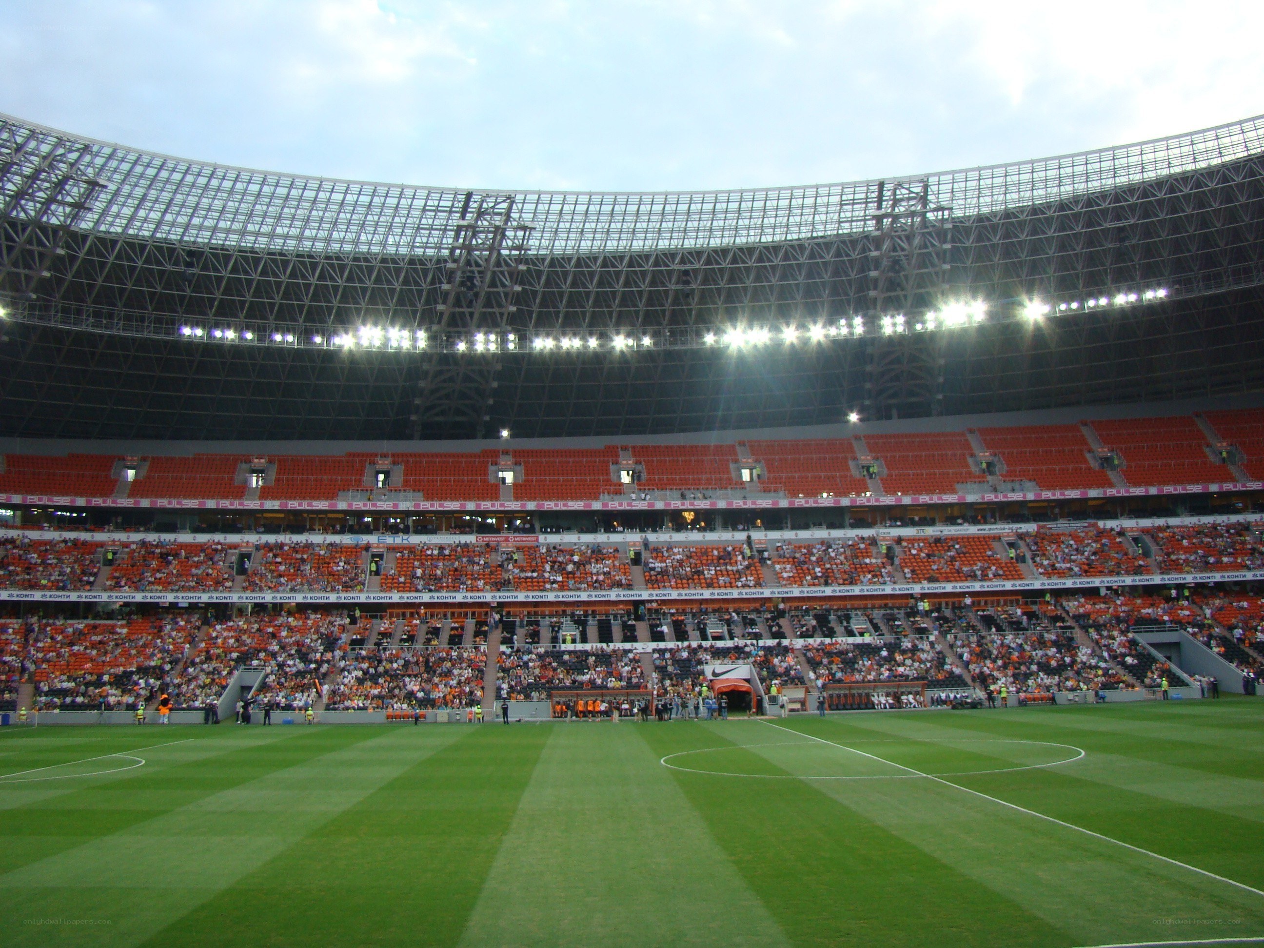 Stadium with fans and field