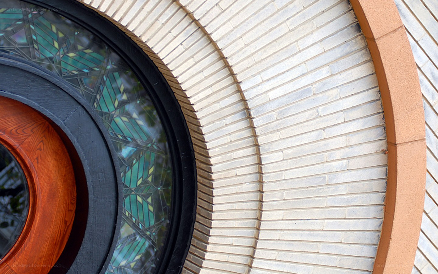Stained glass window with brick arch