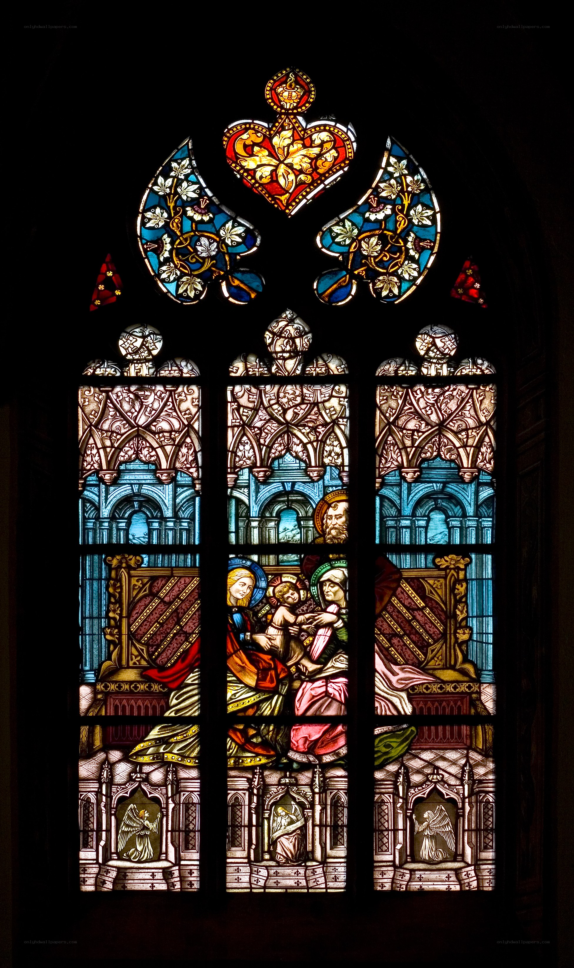 Stained glass window with religious scene