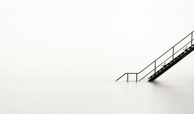 Staircase in a white void