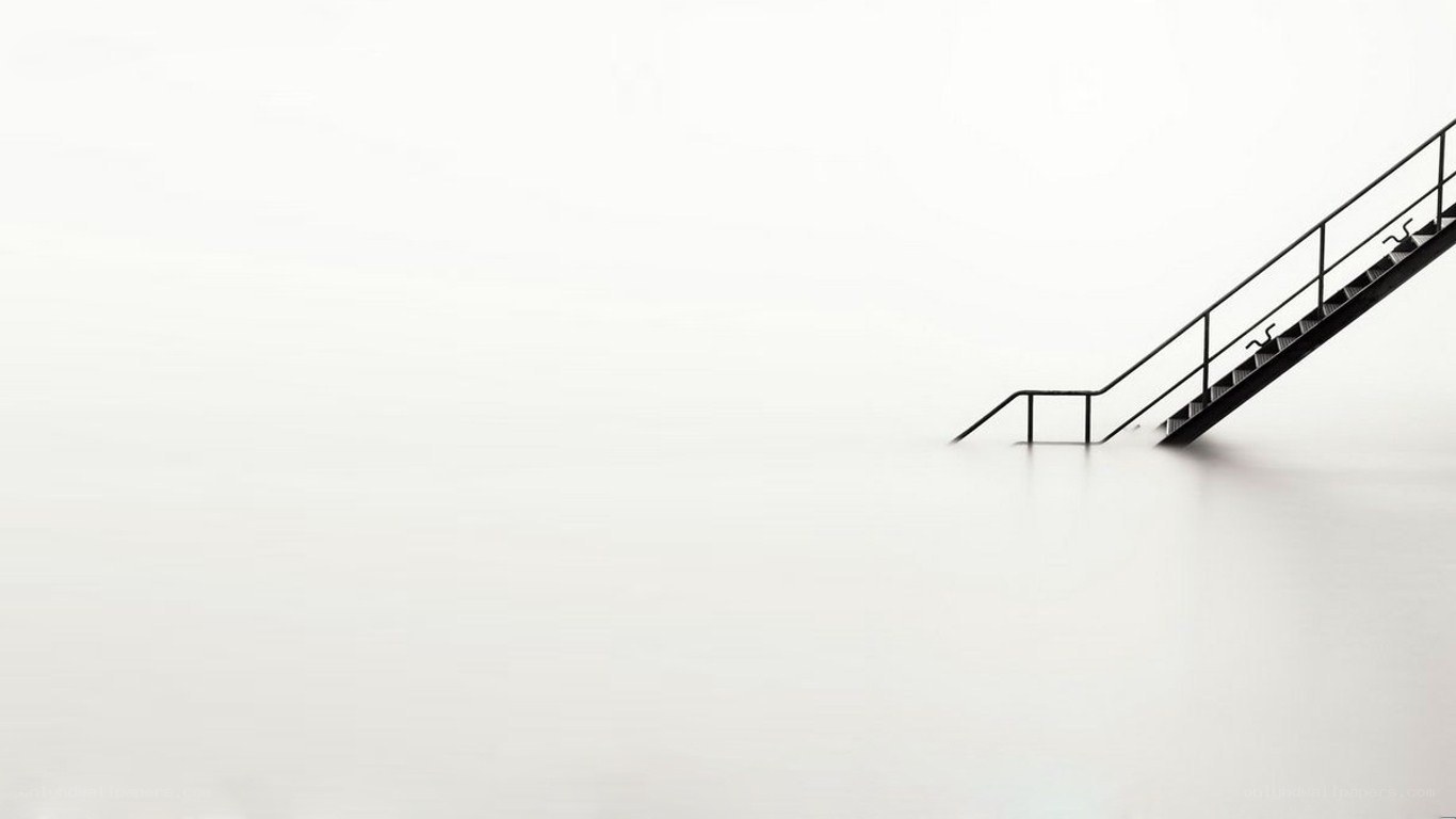 Staircase in misty water