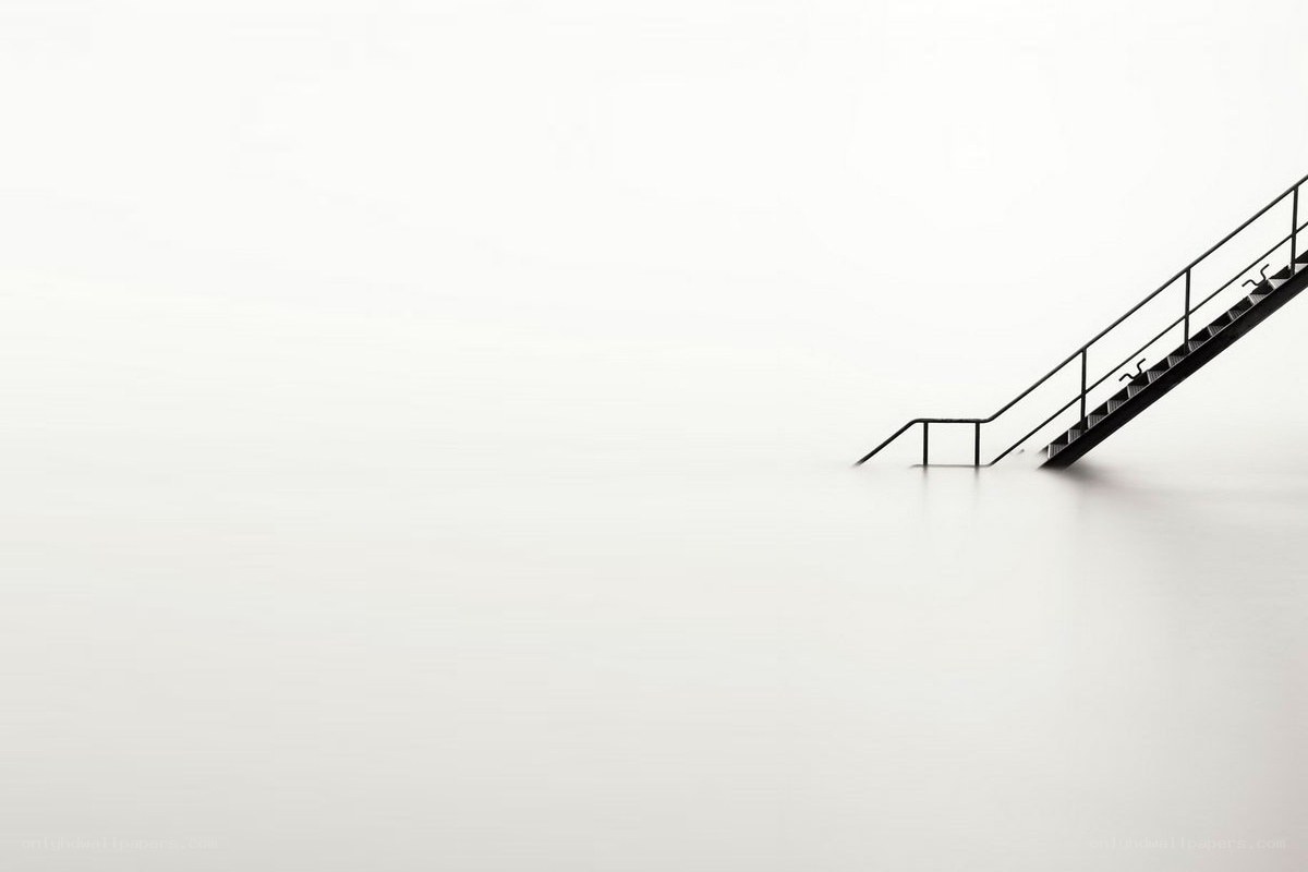Staircase in misty water