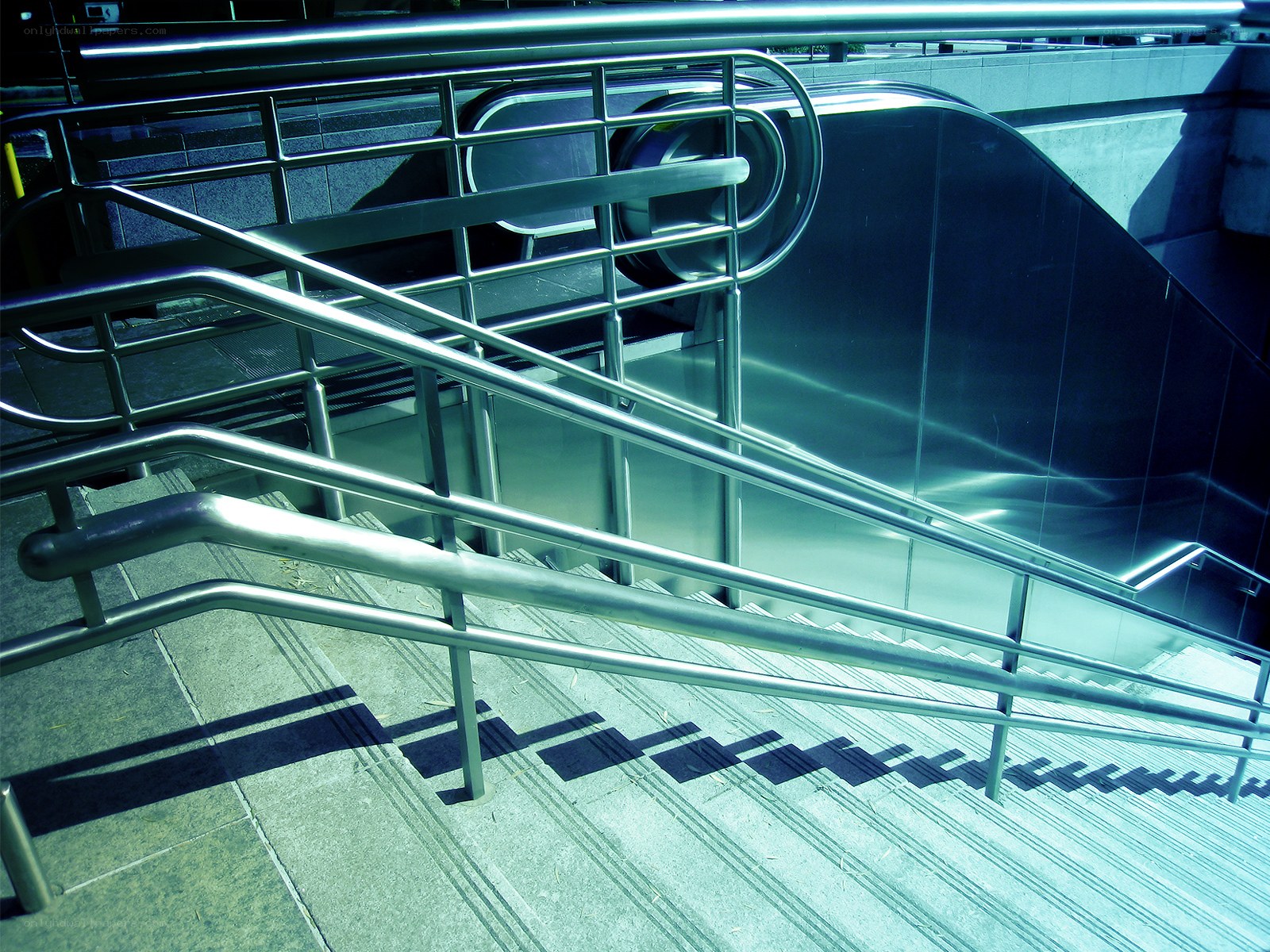 Staircase with metal railings