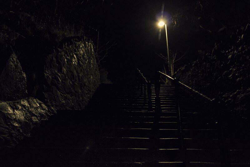 Stairway at night under a streetlight