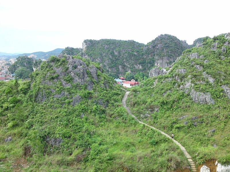 Stairway to a temple on a green hill