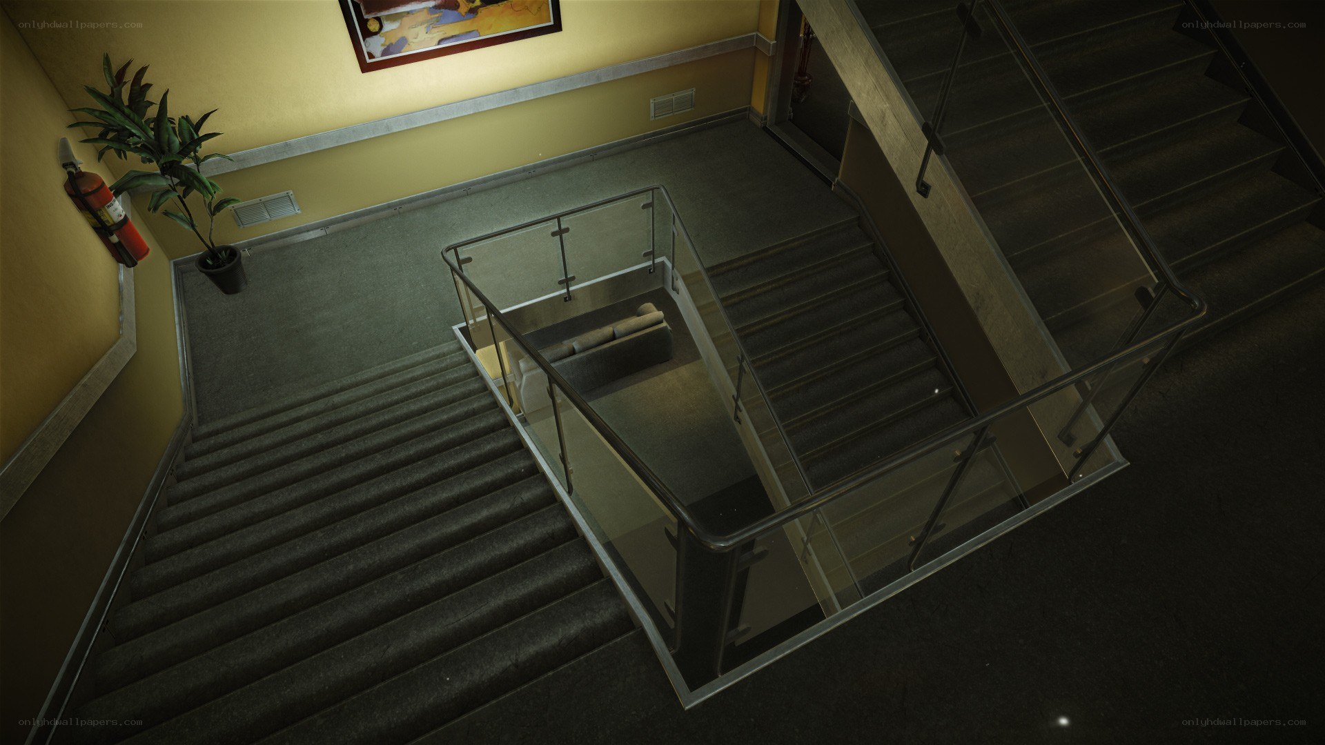 stairwell with glass railing