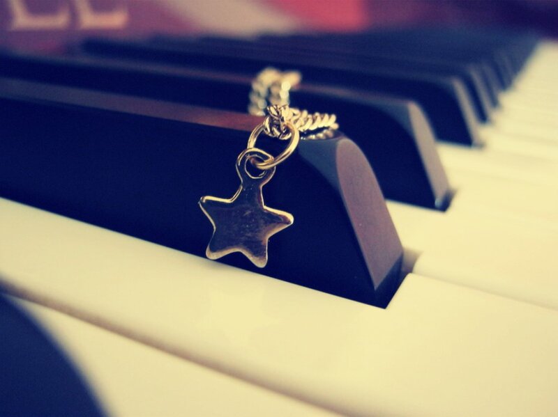 Star Charm on Piano Keys