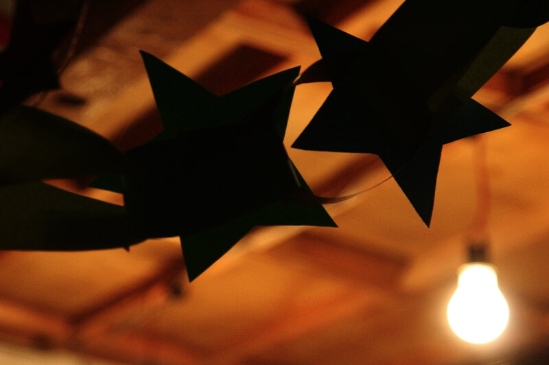 star decorations under warm light
