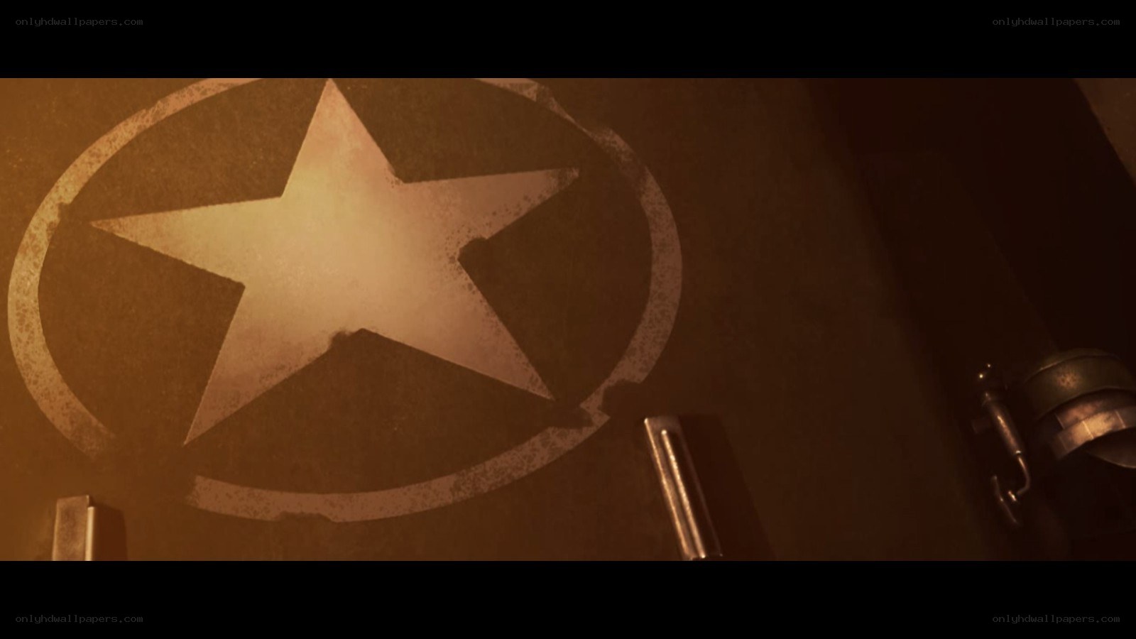 star emblem on metal surface