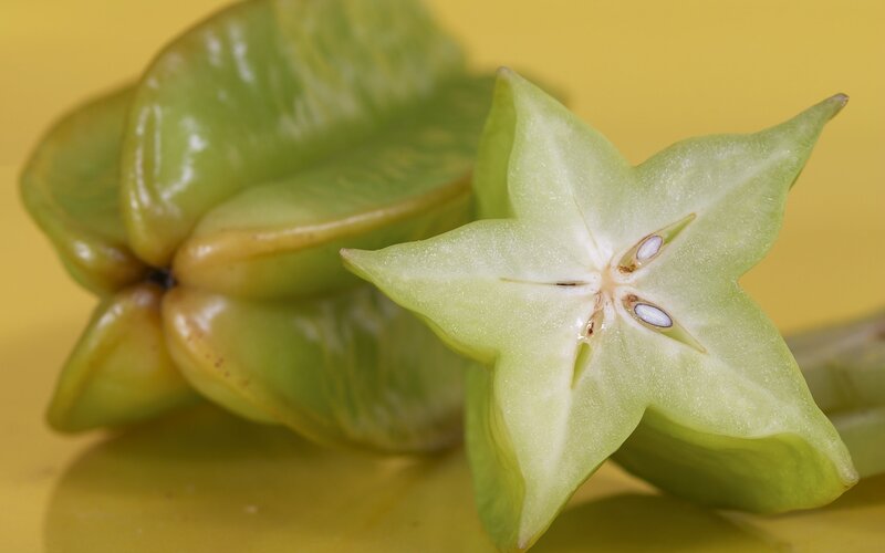 Star fruit cut in half