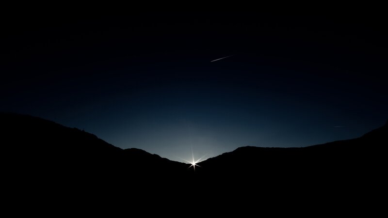 star over mountain silhouette