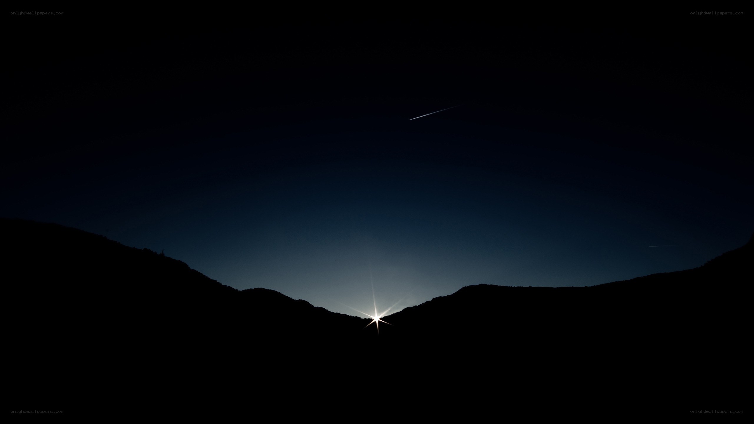 star over mountain silhouette
