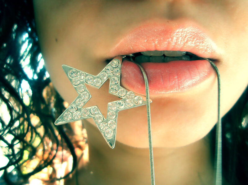 star pendant in mouth