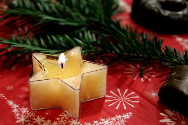 Star-shaped candle on festive table
