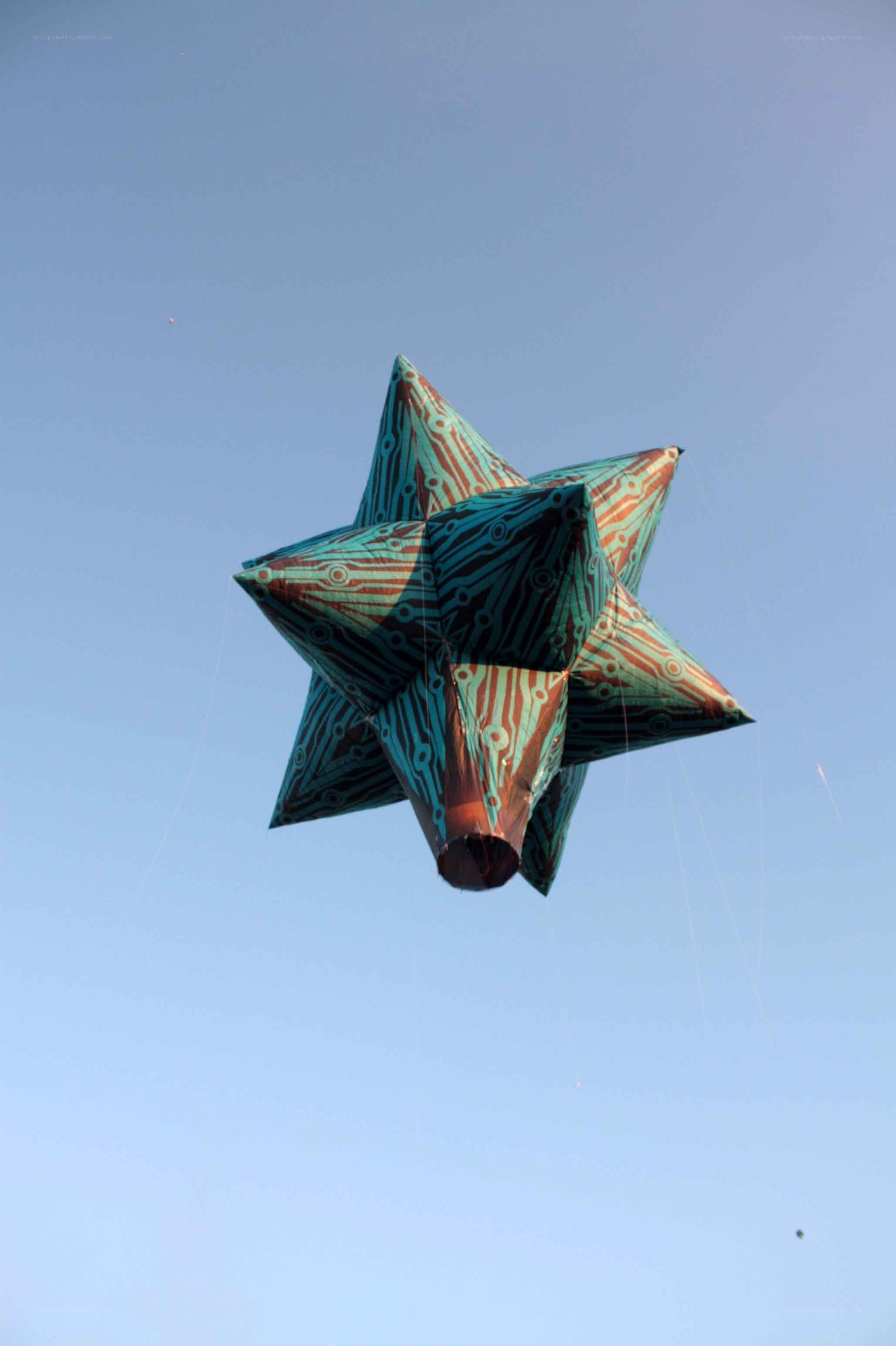 Star-shaped kite in the sky