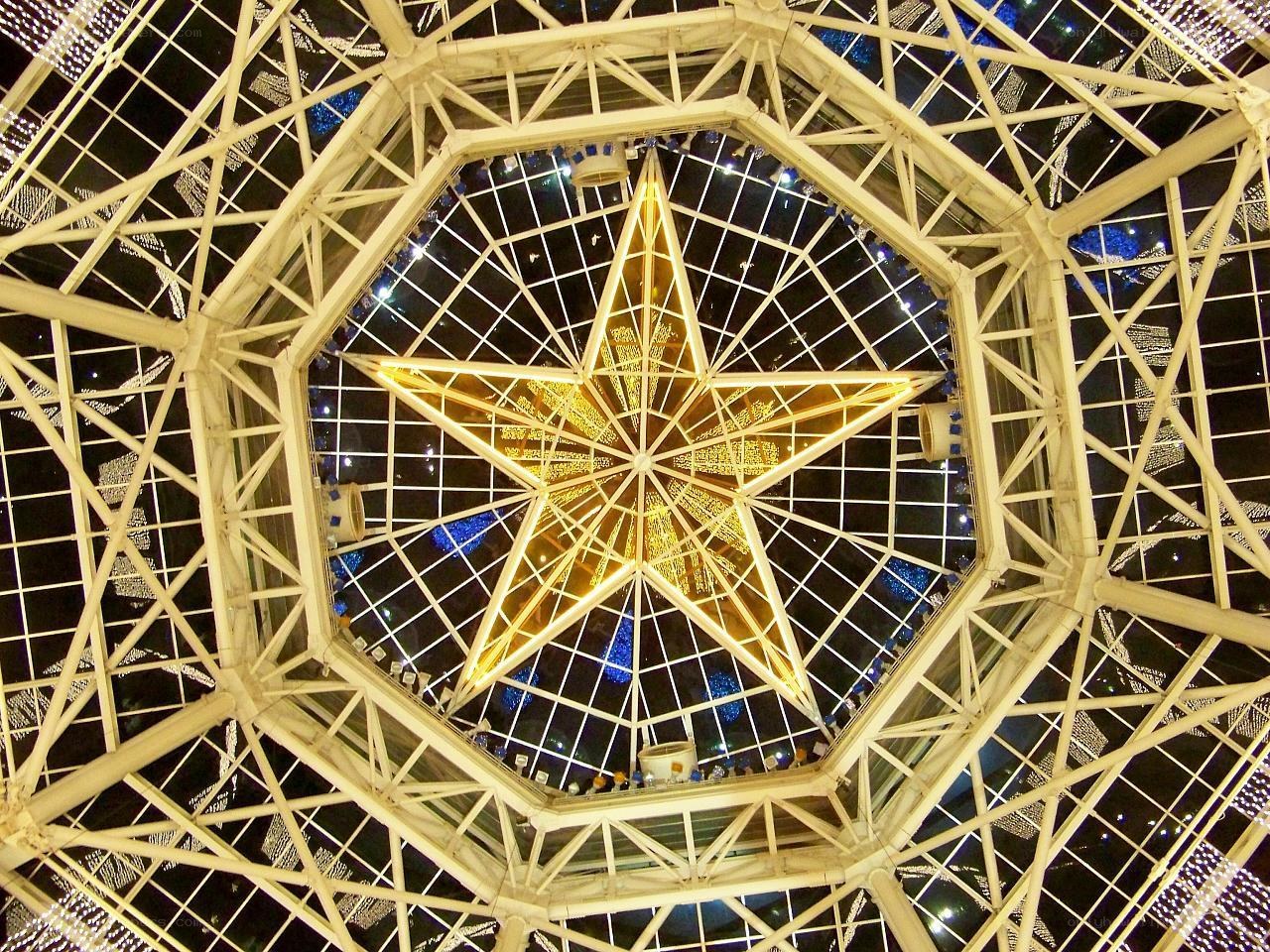 Star-shaped light fixture in dome